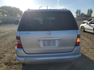 2000 Mercedes-Benz M-Class with VIN 4JGAB54E6YA181947, listed as a Copart auction lot 77781524 with 165,399 mi miles and Salvage Title. Bid and sale history available at carsss.com. Image 6.