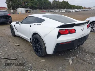 2014 Chevrolet Corvette 1LT z VIN 1G1YA2D7XE5128719, wystawiony jako IAAI lot #40877448 z przebiegiem 75 961 mil mil oraz . Historia ofert i sprzedaży dostępna na DreamBid. Obrazek 3.