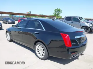 2014 Cadillac CTS Luxury RWD z VIN 1G6AR5SX3E0196348, wystawiony jako IAAI lot #42282732 z przebiegiem 130 956 mil mil oraz . Historia ofert i sprzedaży dostępna na DreamBid. Obrazek 3.