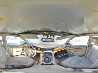 1998 Jaguar XJ with VIN SAJHX1245WC819762, listed as a Copart auction lot 81480174 with 132,491 mi miles and Salvage title. Bid and sale history available at DreamBid. Image 13.