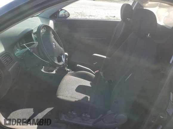 2007 Hyundai Accent GS with VIN KMHCM36CX7U045059, listed as a Copart auction lot 52089115 with 88,166 mi miles and Salvage title. Bid and sale history available at DreamBid. Image 7.