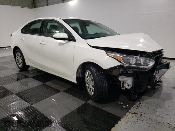 2021 Kia Forte FE with VIN 3KPF24AD4ME402727, listed as a Copart auction lot 58994105 with 89,285 mi miles and Clean title. Bid and sale history available at DreamBid. Image 4.