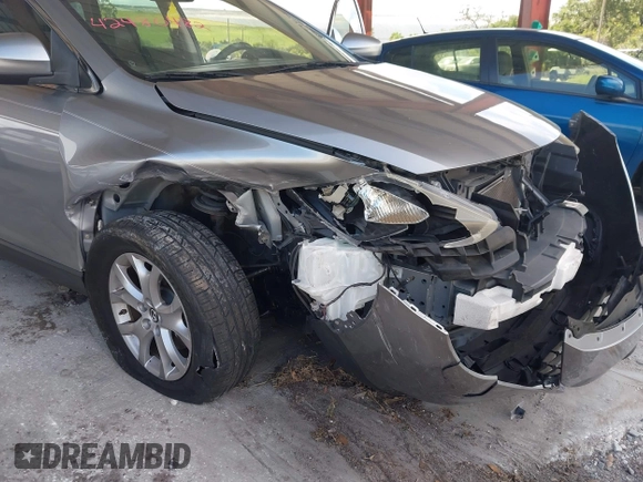 2015 Mazda CX-9 Sport with VIN JM3TB2BA0F0447436, listed as a IAAI auction lot 42480482 with 127,557 mi miles and . Bid and sale history available at DreamBid. Image 6.