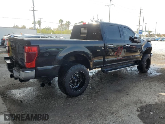 2021 Ford Super Duty F-250 SRW XL with VIN 1FT7W2BT1MEC51277, listed as a Copart auction lot 43544475 with 99,324 mi miles and Salvage Title. Bid and sale history available at carsss.com. Image 3.