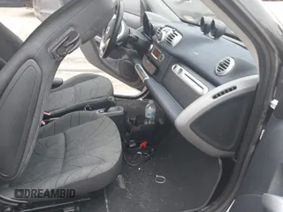 2014 Smart fortwo Pure with VIN WMEEJ3BA2EK779506, listed as a IAAI auction lot 42048566 with 26,102 mi miles and . Bid and sale history available at DreamBid. Image 5.
