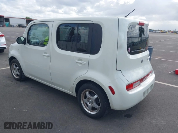 2010 Nissan Cube S z VIN JN8AZ2KRXAT161347, wystawiony jako IAAI lot #41921669 z przebiegiem 161 121 mil mil oraz . Historia ofert i sprzedaży dostępna na DreamBid. Obrazek 3.