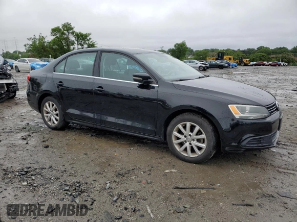 2013 Volkswagen Jetta SE with VIN 3VWDP7AJ4DM425976, listed as a Copart auction lot 58095525 with 77,395 mi miles and Salvage title. Bid and sale history available at DreamBid. Image 4.