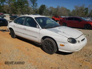 1999 Ford Taurus SE z VIN 1FAFP53U9XA141550, wystawiony jako Copart lot #48824305 z przebiegiem 203 517 mil mil oraz Szkoda całkowita • Salvage title. Historia ofert i sprzedaży dostępna na DreamBid. Obrazek 4.