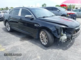 2013 Ford Taurus Limited with VIN 1FAHP2F84DG220283, listed as a IAAI auction lot 40045974 with 155,409 mi miles and . Bid and sale history available at DreamBid. Image 12.