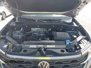 2024 Volkswagen Atlas SE z VIN 1V2KE2CA3RC243791, wystawiony jako IAAI lot #42037645 z przebiegiem 24 932 mil mil oraz . Historia ofert i sprzedaży dostępna na DreamBid. Obrazek 10.
