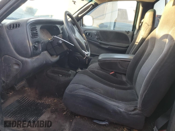 2000 Dodge Dakota z VIN 1B7FL26X5YS793314, wystawiony jako Copart lot #79477744 z przebiegiem 358 319 mil mil oraz Szkoda całkowita • Salvage title. Historia ofert i sprzedaży dostępna na DreamBid. Obrazek 7.
