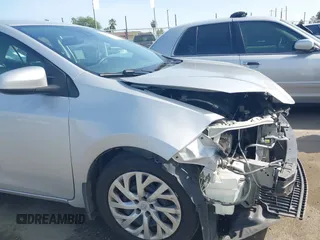 2019 Toyota Corolla L with VIN 2T1BURHE2KC190975, listed as a IAAI auction lot 41901370 with 94,925 mi miles. Bid and sale history available at carsss.com. Image 19.