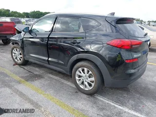 2019 Hyundai Tucson Value with VIN KM8J33A40KU068014, listed as a IAAI auction lot 40877057 with 34,966 mi miles. Bid and sale history available at carsss.com. Image 3.