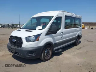 2023 Ford Transit Passenger XL with VIN 1FBAX2CG7PKC04821, listed as a IAAI auction lot 42379783 with 15,909 mi miles and . Bid and sale history available at DreamBid. Image 2.