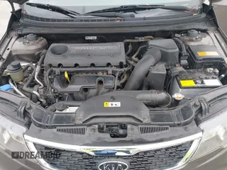 2013 Kia Forte EX with VIN KNAFU4A22D5711825, listed as a IAAI auction lot 42128778 with 112,889 mi miles. Bid and sale history available at carsss.com. Image 10.