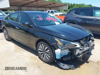 2023 Nissan Altima SV z VIN 1N4BL4DVXPN313556, wystawiony jako IAAI lot #42390484 z przebiegiem 51 424 mil mil oraz . Historia ofert i sprzedaży dostępna na DreamBid. Obrazek 1.