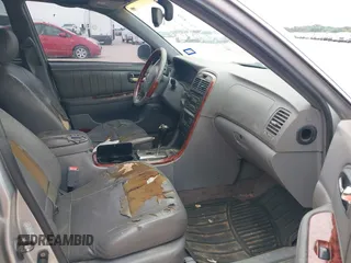2003 Kia Optima LX z VIN KNAGD128235248556, wystawiony jako IAAI lot #42366002 z przebiegiem 140 904 mil mil oraz . Historia ofert i sprzedaży dostępna na DreamBid. Obrazek 5.