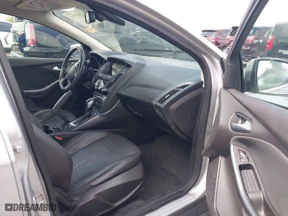 2012 Ford Focus Titanium with VIN 1FAHP3J29CL262348, listed as a IAAI auction lot 41812310 with 81,645 mi miles. Bid and sale history available at carsss.com. Image 5.