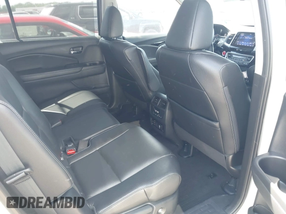 2017 Honda Pilot Touring with VIN 5FNYF6H92HB054145, listed as a IAAI auction lot 42200391 with 70,096 mi miles and . Bid and sale history available at DreamBid. Image 8.