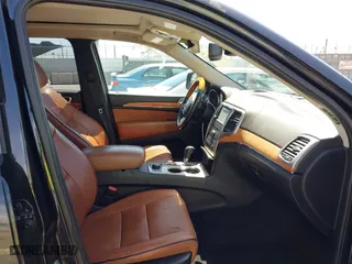 2012 Jeep Grand Cherokee Overland with VIN 1C4RJFCT7CC185602, listed as a IAAI auction lot 42018715 with 91,507 mi miles. Bid and sale history available at carsss.com. Image 5.