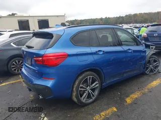 2016 BMW X1 xDrive28i with VIN WBXHT3C31G5E55119, listed as a IAAI auction lot 40894704 with 126,561 mi miles. Bid and sale history available at carsss.com. Image 4.