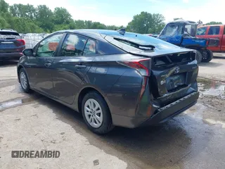 2016 Toyota Prius Two z VIN JTDKBRFU2G3014010, wystawiony jako IAAI lot #42254617 z przebiegiem 171 521 mil mil oraz . Historia ofert i sprzedaży dostępna na DreamBid. Obrazek 3.
