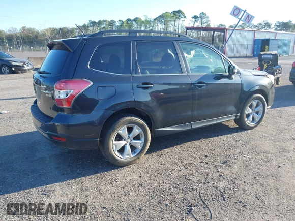 2014 Subaru Forester 2.5i Touring with VIN JF2SJAMC1EH452856, listed as a IAAI auction lot 41801406 with 148,342 mi miles. Bid and sale history available at carsss.com. Image 4.