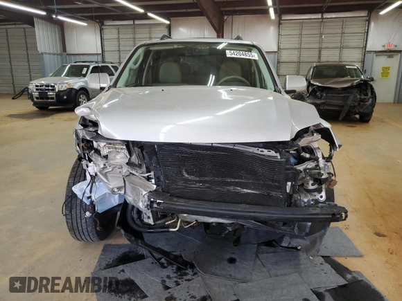 2009 Mercury Mariner Premier z VIN 4M2CU87GX9KJ17731, wystawiony jako Copart lot #54204855 z przebiegiem 54 521 mil mil oraz Szkody całkowita. Historia ofert i sprzedaży dostępna na DreamBid. Obrazek 5.