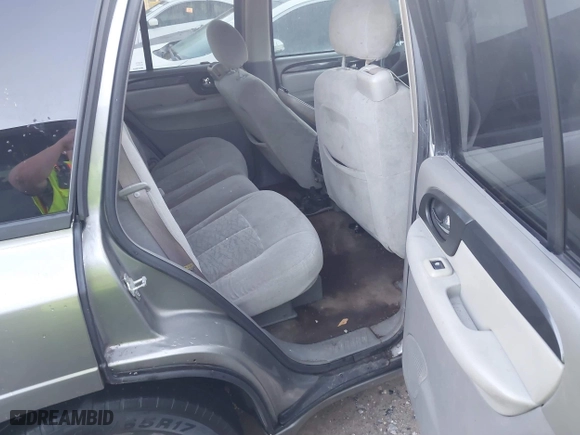 2005 GMC Envoy SLE with VIN 1GKDS13S352215032, listed as a IAAI auction lot 41221612 with 260,647 mi miles. Bid and sale history available at carsss.com. Image 8.