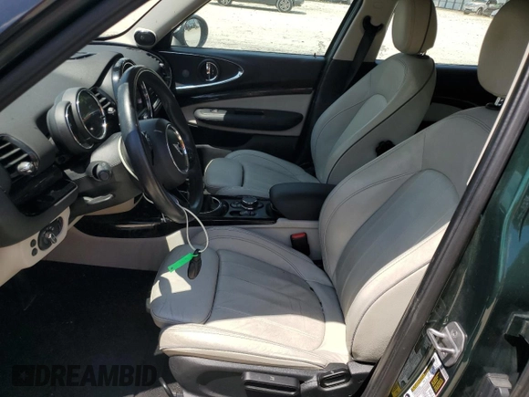 2016 MINI Clubman z VIN WMWLN5C5XG2E29275, wystawiony jako Copart lot #68162014 z przebiegiem 79 754 mil mil oraz Nie do naprawy. Historia ofert i sprzedaży dostępna na DreamBid. Obrazek 7.