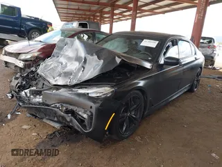 2018 BMW 7 Series 750i z VIN WBA7F0C53JGM23522, wystawiony jako IAAI lot #41789290 z przebiegiem Nie podano mil oraz . Historia ofert i sprzedaży dostępna na DreamBid. Obrazek 2.