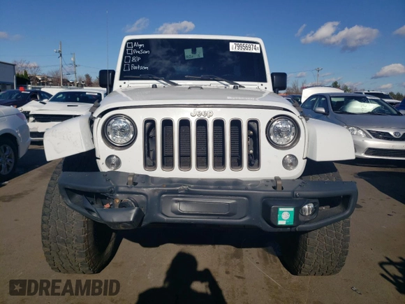 2018 Jeep Wrangler JK Unlimited Sport S with VIN 1C4BJWDG2JL913150, listed as a Copart auction lot 79956974 with 86,153 mi miles and Salvage Title. Bid and sale history available at carsss.com. Image 5.