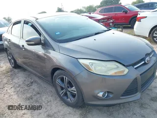2014 Ford Focus SE with VIN 1FADP3F24EL320991, listed as a IAAI auction lot 41932638 with 133,163 mi miles. Bid and sale history available at carsss.com. Image 1.