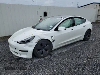 2023 Tesla Model 3 z VIN 5YJ3E1EA8PF588554, wystawiony jako Copart lot #59923815 z przebiegiem Nie podano mil oraz Szkoda całkowita • Salvage title. Historia ofert i sprzedaży dostępna na DreamBid. Obrazek 1.