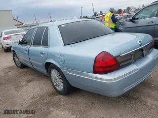 2010 Mercury Grand Marquis LS with VIN 2MEBM7FV0AX613519, listed as a IAAI auction lot 41582646 with 201,854 mi miles. Bid and sale history available at carsss.com. Image 3.