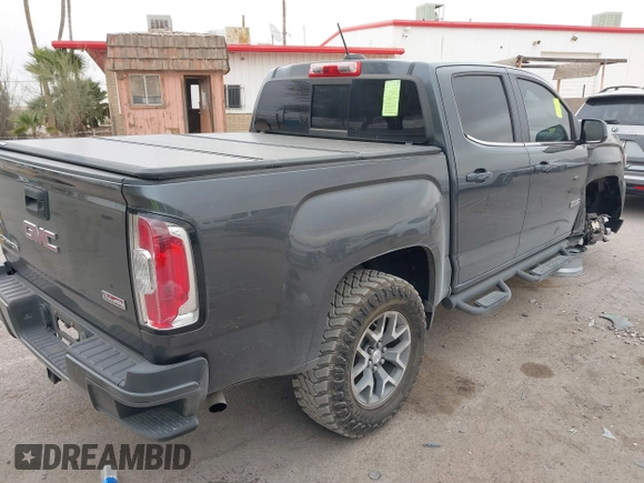2016 GMC Canyon 4WD SLE with VIN 1GTG6CE3XG1224575, listed as a IAAI auction lot 41265987 with 118,345 mi miles. Bid and sale history available at carsss.com. Image 4.
