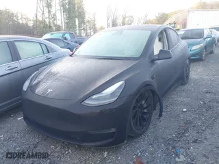 2022 Tesla Model Y Performance with VIN 7SAYGDEF3NF397671, listed as a IAAI auction lot 41459991 with NaN miles. Bid and sale history available at carsss.com. Image 18.