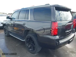 2015 Chevrolet Tahoe LTZ with VIN 1GNSCCKC8FR617540, listed as a IAAI auction lot 41356342 with 118,268 mi miles. Bid and sale history available at carsss.com. Image 3.