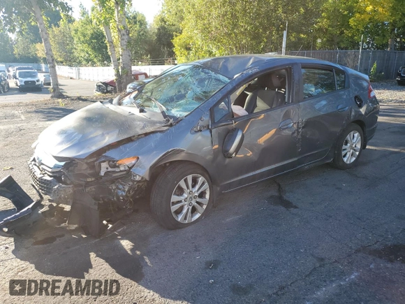 2012 Honda Insight EX z VIN JHMZE2H72CS006248, wystawiony jako Copart lot #73184844 z przebiegiem Nie podano mil oraz Szkoda całkowita • Salvage title. Historia ofert i sprzedaży dostępna na DreamBid. Obrazek 1.