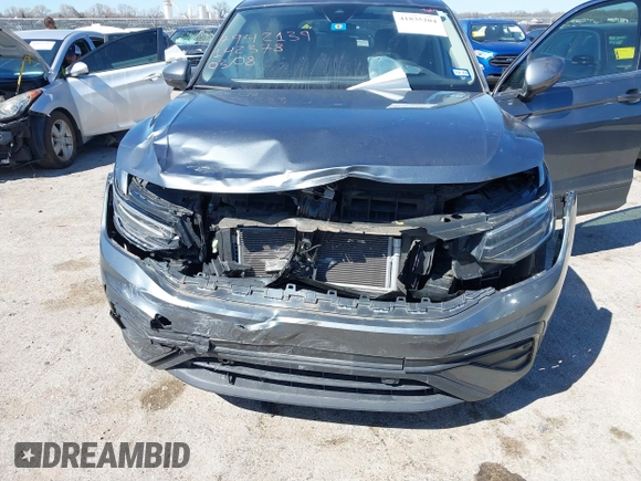 2023 Volkswagen Tiguan SE with VIN 3VV3B7AX5PM142378, listed as a IAAI auction lot 41835204 with 13,670 mi miles and . Bid and sale history available at DreamBid. Image 6.