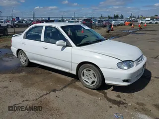 2001 Kia Sephia with VIN KNAFB121815044460, listed as a IAAI auction lot 41846087 with 294,862 mi miles and . Bid and sale history available at DreamBid. Image 1.