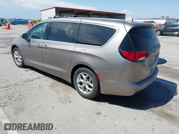 2018 Chrysler Pacifica Touring Plus with VIN 2C4RC1FG4JR306554, listed as a IAAI auction lot 41984255 with 107,109 mi miles and . Bid and sale history available at DreamBid. Image 3.