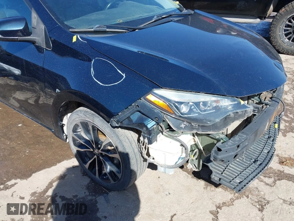 2017 Toyota Corolla L z VIN 5YFBURHE0HP721258, wystawiony jako IAAI lot #41706824 z przebiegiem 158 554 mil mil oraz . Historia ofert i sprzedaży dostępna na DreamBid. Obrazek 20.