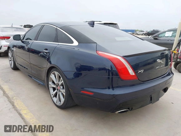 2018 Jaguar XJ R-Sport with VIN SAJWA1C74J8W14026, listed as a IAAI auction lot 42032719 with 95,263 mi miles and . Bid and sale history available at DreamBid. Image 3.