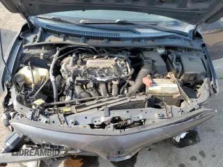2012 Toyota Corolla L z VIN 2T1BU4EE2CC784314, wystawiony jako Copart lot #57239015 z przebiegiem 168 527 mil mil oraz Szkoda całkowita • Salvage title. Historia ofert i sprzedaży dostępna na DreamBid. Obrazek 11.