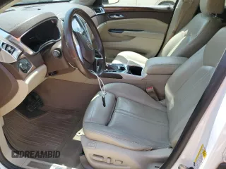 2014 Cadillac SRX Luxury Collection z VIN 3GYFNBE30ES685072, wystawiony jako Copart lot #58122705 z przebiegiem 128 013 mil mil oraz Szkoda całkowita • Salvage title. Historia ofert i sprzedaży dostępna na DreamBid. Obrazek 7.