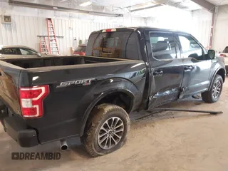 2018 Ford F-150 XL with VIN 1FTEW1EP8JFB43342, listed as a IAAI auction lot 41985525 with 147,839 mi miles and . Bid and sale history available at carsss.com. Image 4.