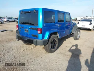 2014 Jeep Wrangler Unlimited Sahara with VIN 1C4HJWEG1EL188445, listed as a IAAI auction lot 42742737 with 79,948 mi miles and . Bid and sale history available at DreamBid. Image 4.