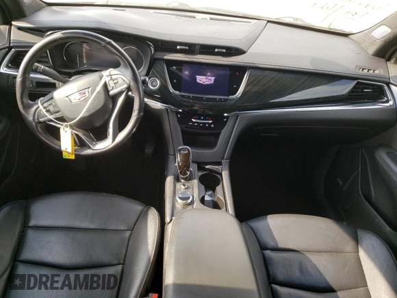 2020 Cadillac XT6 FWD Premium Luxury with VIN 1GYKPCRS6LZ102682, listed as a Copart auction lot 56906645 with 76,884 mi miles and Salvage title. Bid and sale history available at DreamBid. Image 8.
