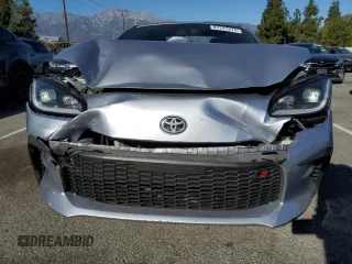 2022 Toyota GR86 Premium with VIN JF1ZNBE12N9753110, listed as a Copart auction lot 87231314 with 27,069 mi miles and Salvage Title. Bid and sale history available at carsss.com. Image 5.